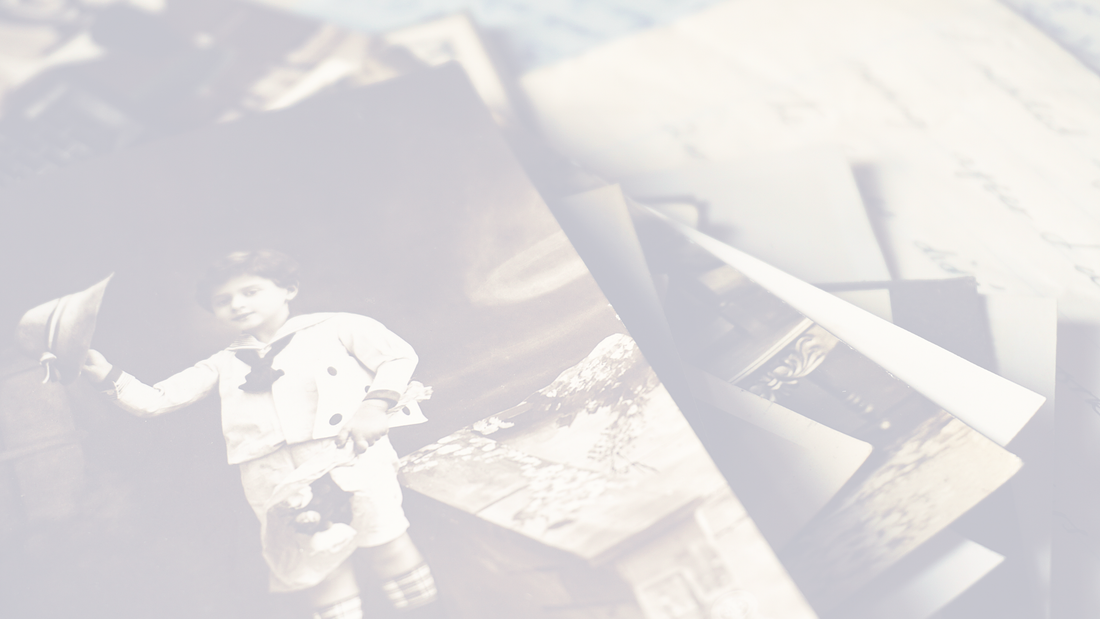 Vintage family photographs on a soft linen background — symbolizing memory and legacy.